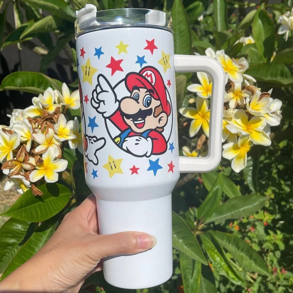 Nintendo Super Mario Bros Tumbler 40 oz umbler with hand carry handle. Brand New